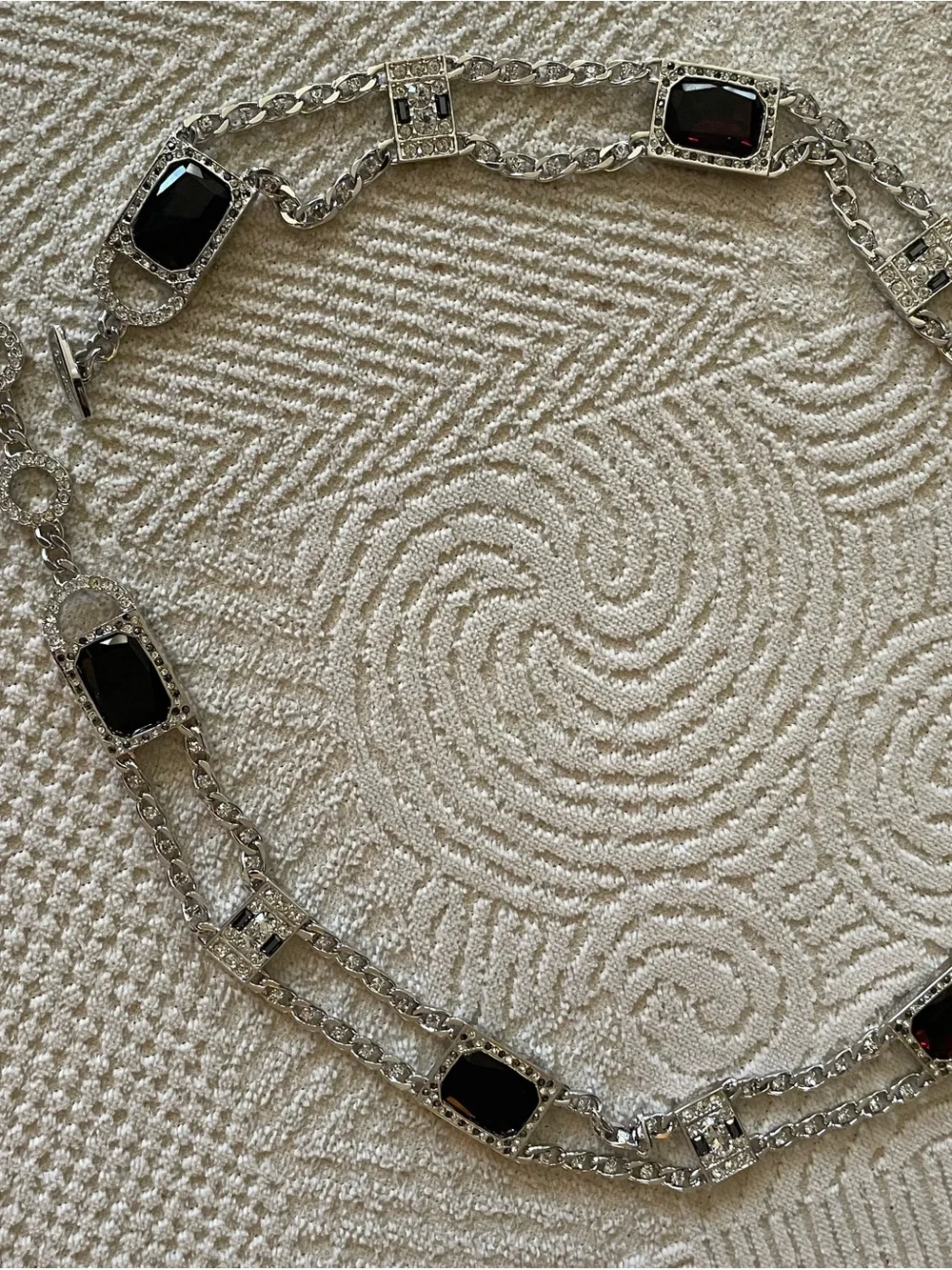 St John’s silver toned belt